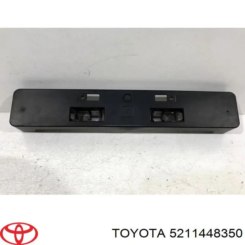 Кріплення переднього номера автомобіля Toyota 5211448350 ціна, від 49.57 USD
