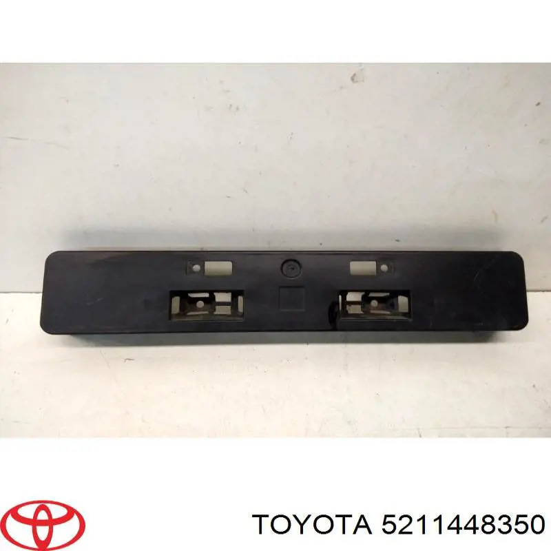 Купити 5211448350 Toyota Кронштейн переднього номерного знака