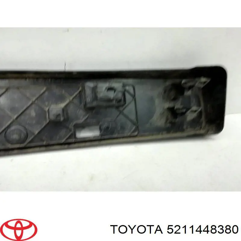 Купити 5211448380 Toyota Кронштейн переднього номерного знака