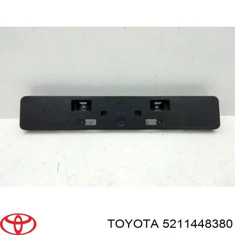 Кріплення переднього номера автомобіля Toyota 5211448380 ціна, від 48.86 USD