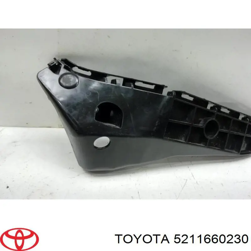 Купити 5211660230 Toyota Кронштейн бампера переднього, зовнішній лівий