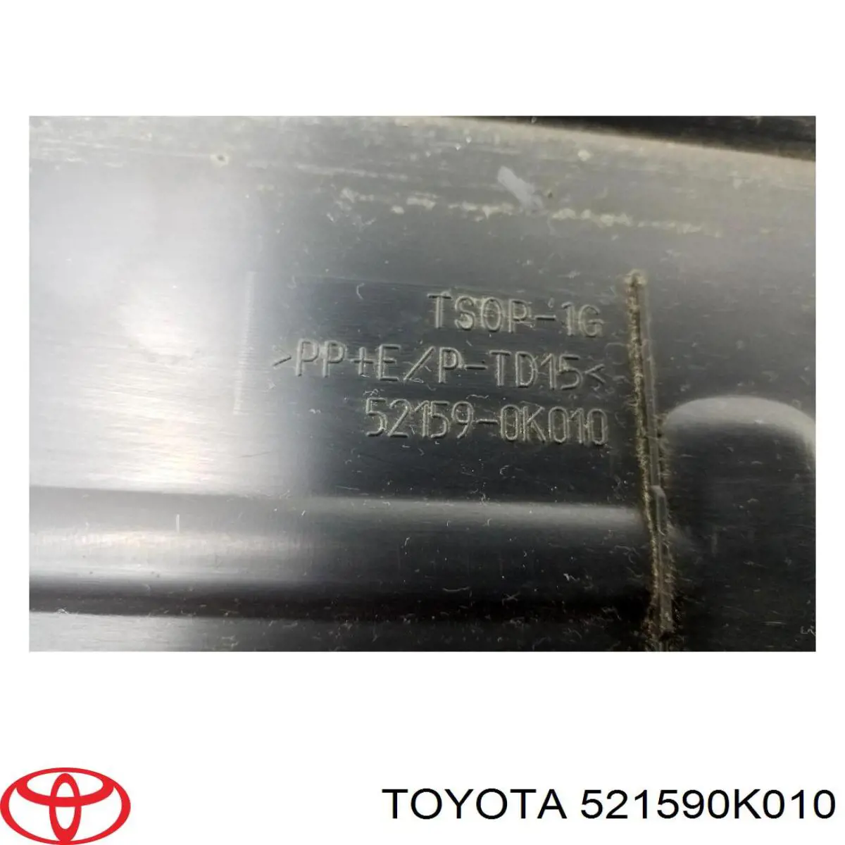 521590K010 Toyota накладка бампера заднього, центральна