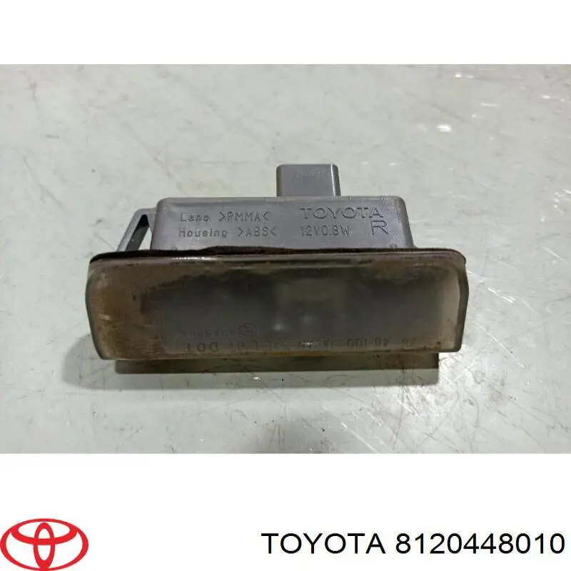 Купити 8120448010 Toyota Ліхтар підсвічування заднього номерного знака