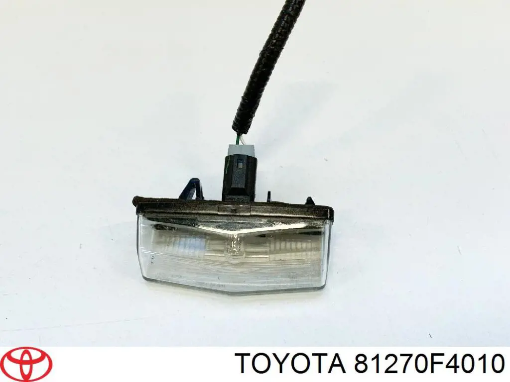 81270F4010 Toyota Ліхтар освітлення номерного знака