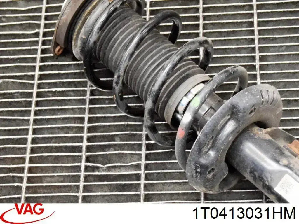 Амортизатор передній 1T0413031HM VAG