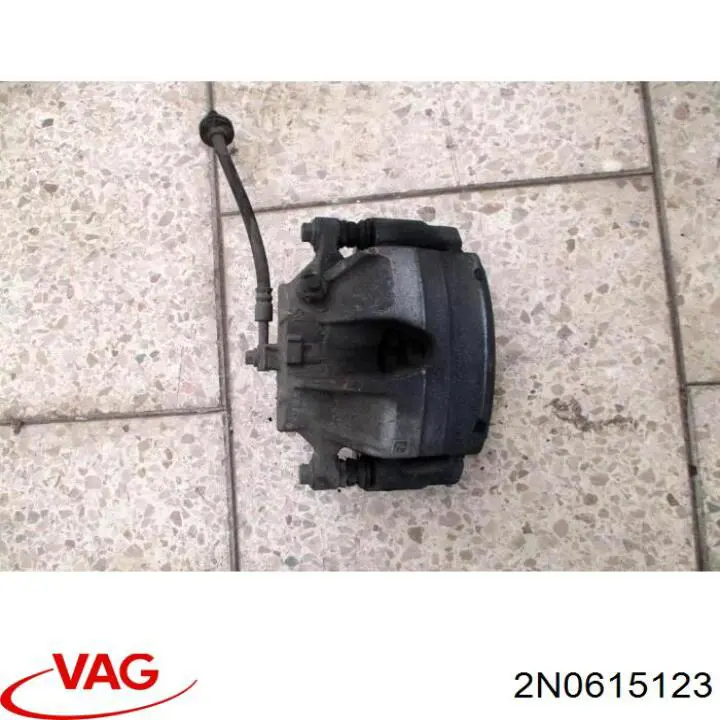 2N0615123 VAG Супорт гальмівний, передній, лівий