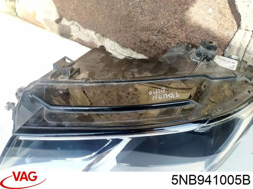 Фара ліва 5NB941005B VAG