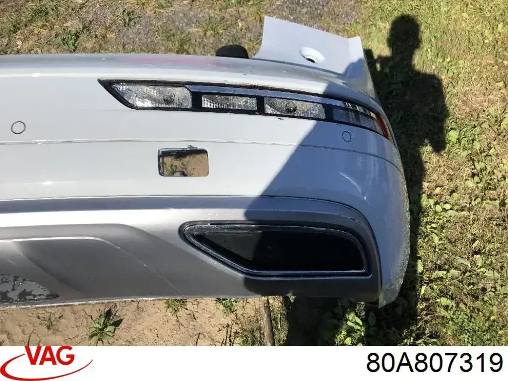 Купити 80A807319 VAG Накладка бампера заднього, ліва