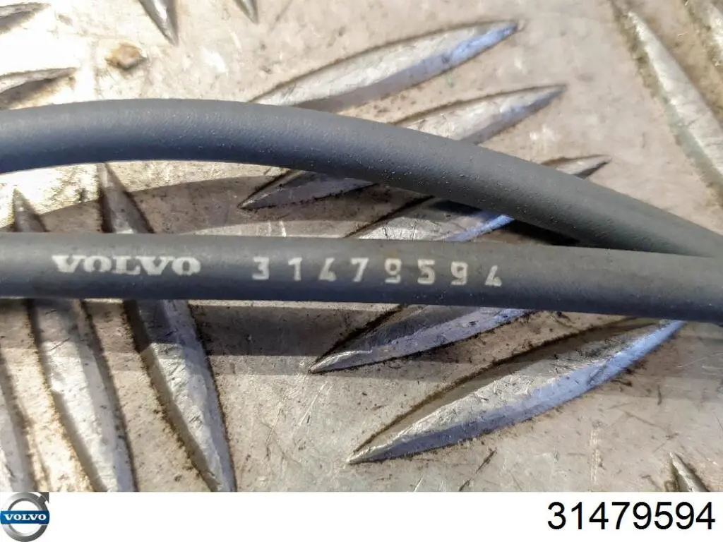 31457142 Volvo Трос відкриття капота, задній