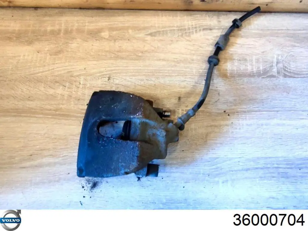 Супорт гальмівний, передній, правий Ford 1477828