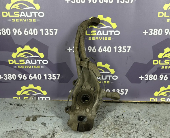 Цапфа - поворотний кулак передній, лівий 40015EB000 NISSAN