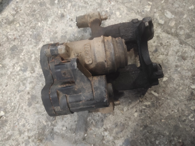 Задній гальмівний супорт лівий 3Q0615423E VAG