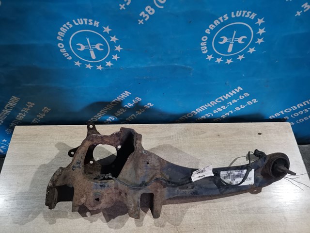 Важіль/тяга задньої підвіски подовжній нижній, лівий 1355136 FORD