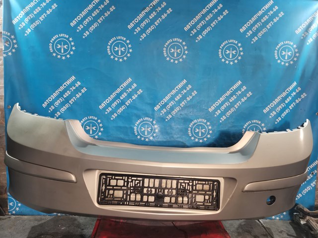 Бампер задній 1404175 OPEL
