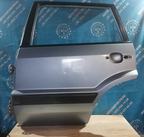 Двері пасажирськи задні ліві Ford Fusion