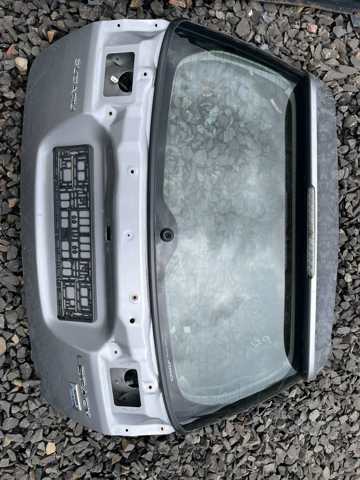 Скло двері задка 63011AG070 SUBARU