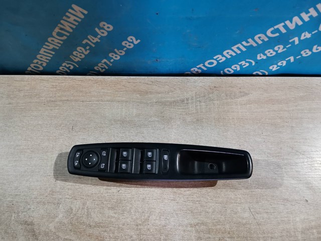 Кнопки переднього лівого склопід'ємника 809610017R RENAULT