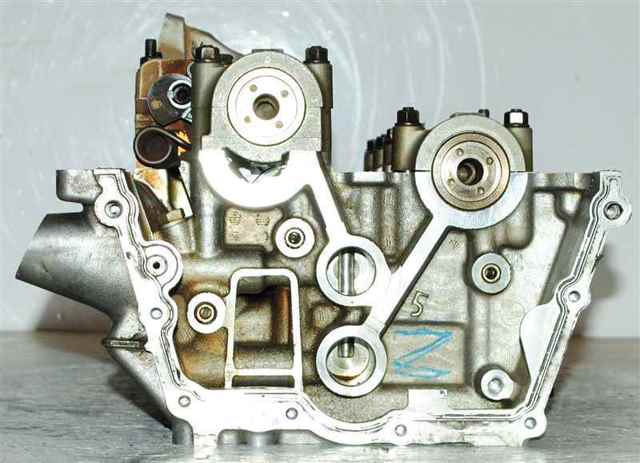 Головка блока циліндрів (ГБЦ) 11121555077 BMW