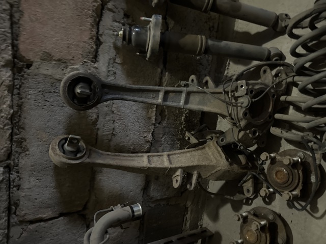 Важіль/тяга задньої підвіски подовжній нижній, правий 4125A034 MITSUBISHI