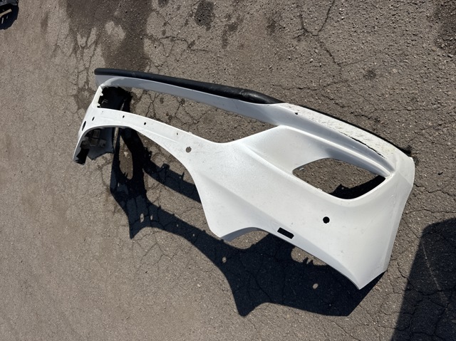 Бампер передній GHP950031 MAZDA