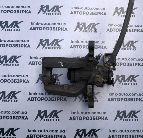 Задній гальмівний супорт лівий 13300861 GM