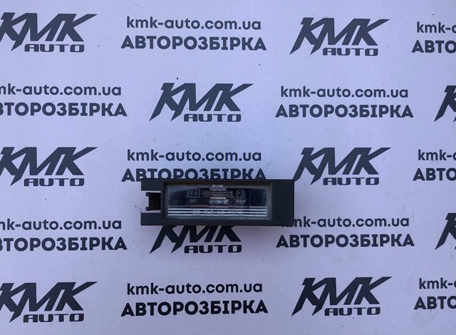 Ліхтар підсвічування заднього номерного знака 9164143 GM