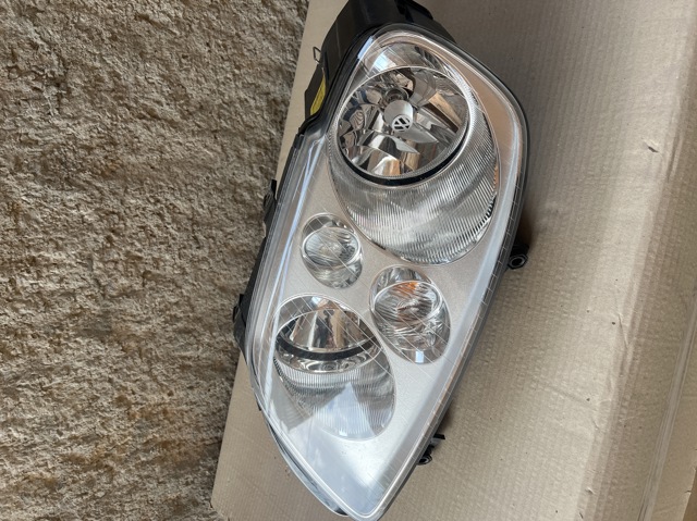 Фара ліва Volkswagen Caddy III
