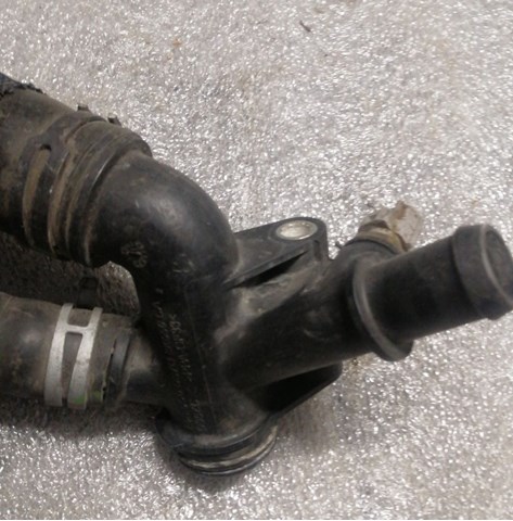 Водяний патрубок DS7Z8K556G FORD