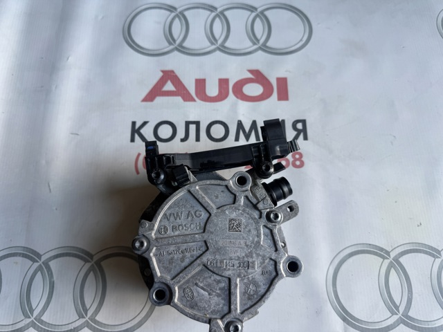 Насос вакуумний 06K145100AB VAG