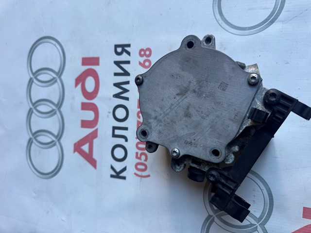 Насос вакуумний 06K145100B VAG