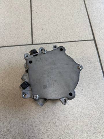 Насос вакуумний 06K145100BB VAG