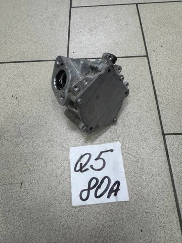 Насос вакуумний 06K145100CB VAG