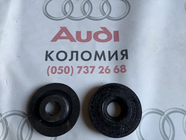 Проставка (гумове кільце) пружини задньої, верхня 1EA512149 VAG