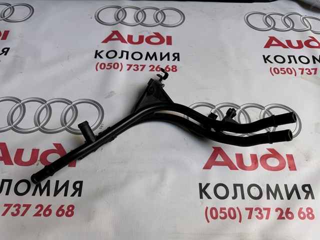 Патрубок системи охолодження 1K0121070BD VAG