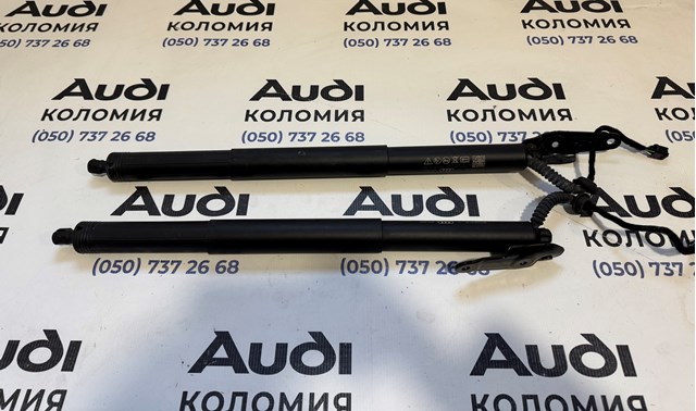 Амортизатор для багажника газовий 80A827851C VAG
