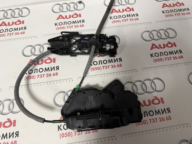 Замок задньої двері, лівої 83A839015 VAG