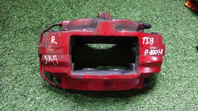 Супорт гальмівний задній правий 102764400A TESLA
