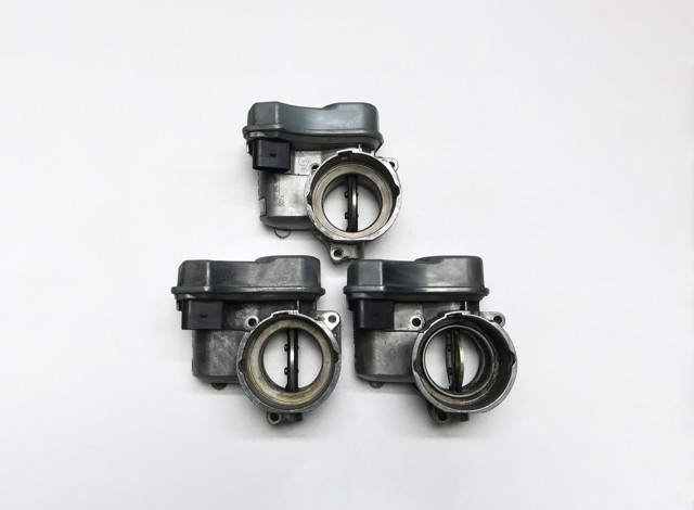 Дросільна заслінка в зборі 03G128063L VAG