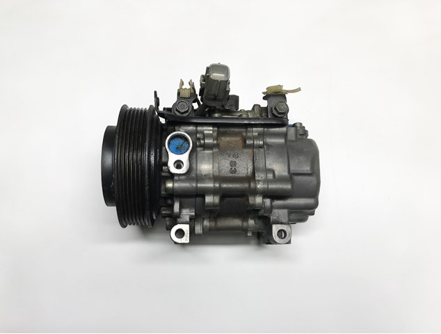 Компресор кондиціонера 73111AE030 SUBARU