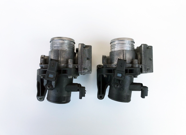Блок дросельної заслінки 7V2Q9E926AB FORD