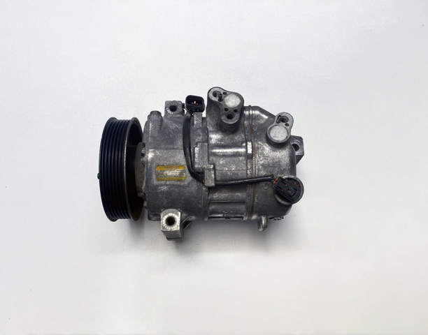 Компресор системи кондиціювання 977012P200 HYUNDAI