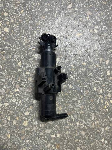 Форсунка омивача фари передньої, лівої CV4413L015BA FORD