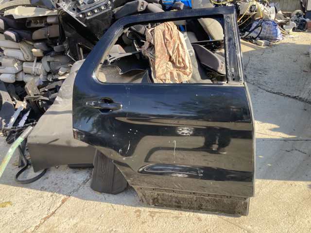 Двері пасажирські задні праві FB5Z7824630A FORD