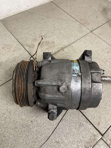 Компресор кліматичної установки 7700105765 RENAULT