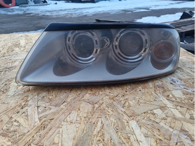 Блок фара ліва 7L6941015BK VAG