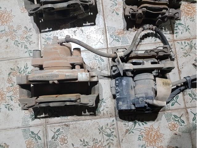 Супорт гальмівний задній правий DG9Z2552A FORD
