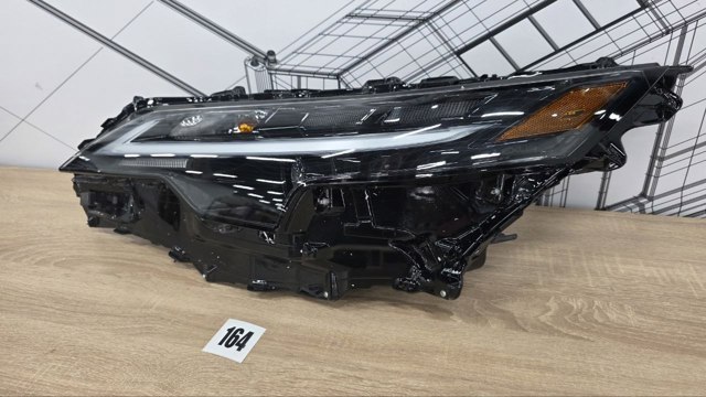 Основна фара в зборі ліва 811500E710 TOYOTA