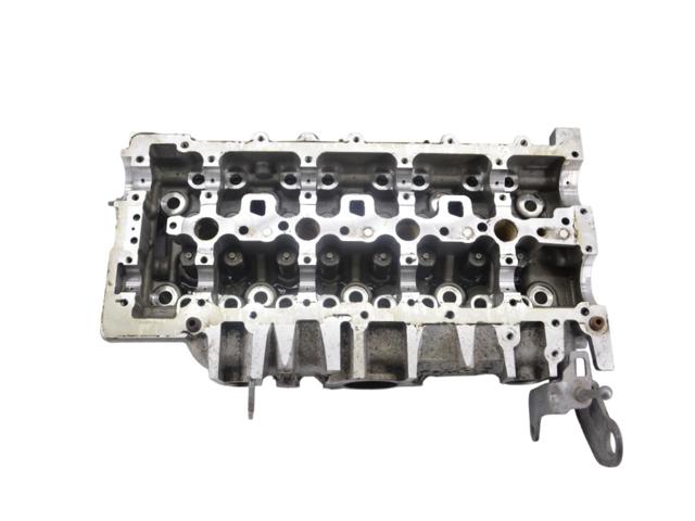 Головка блока циліндрів (ГБЦ) 1683822 FORD