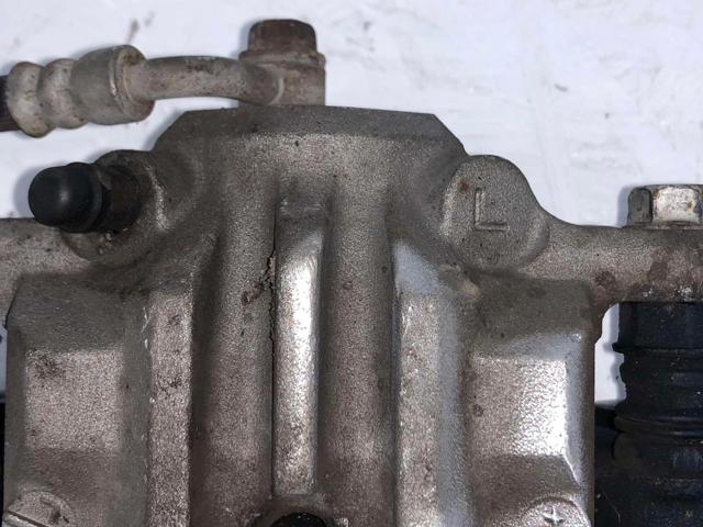 Задній гальмівний супорт лівий 26692AJ010 SUBARU