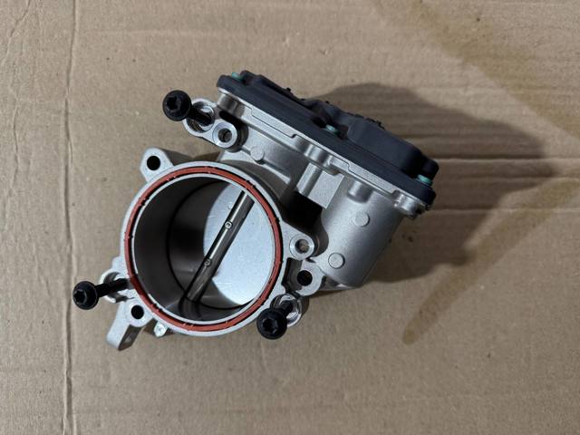 Блок дросельної заслінки 13548601651 BMW